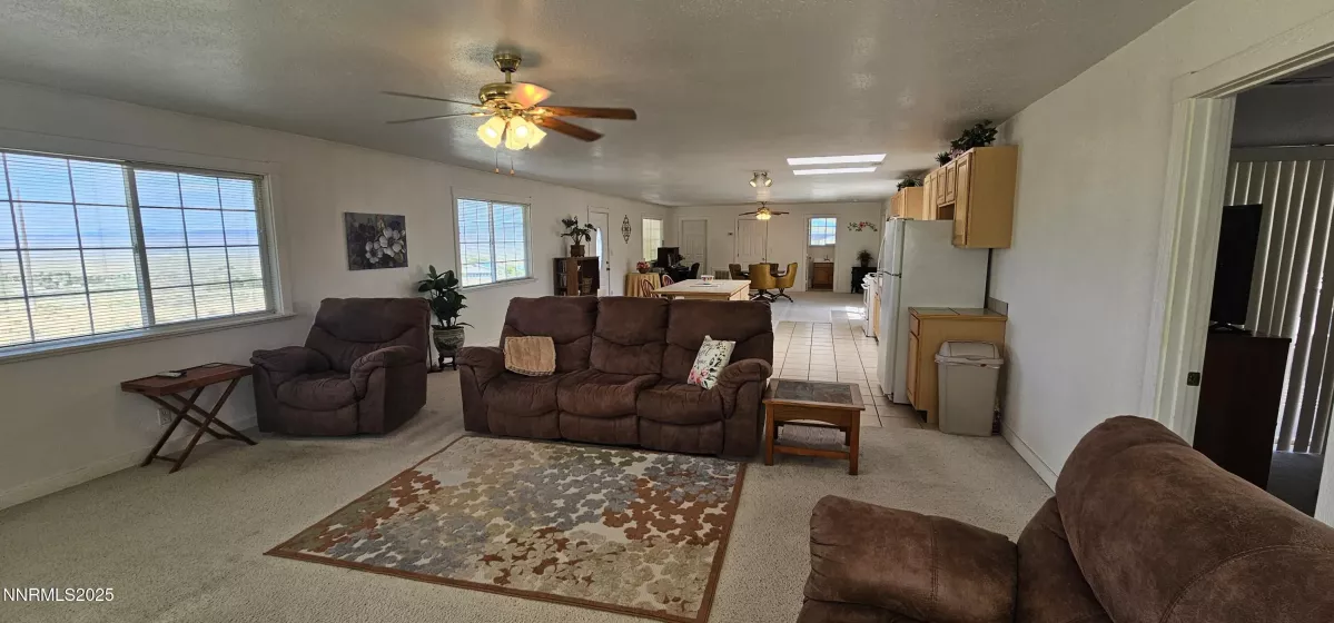 30X40 Metal shop w/ local wildlife enjoying the shade from the warm sun
