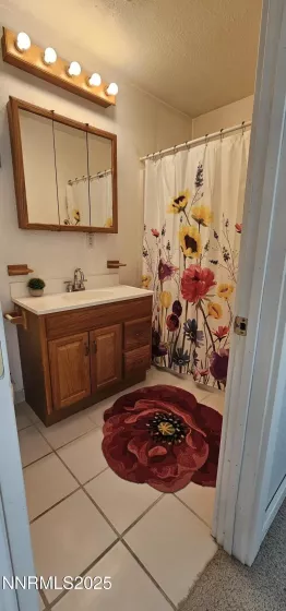 Breezeway access into dining area and both bedrooms via sliding glass doors.