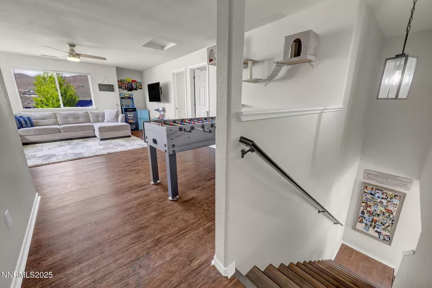 Upstairs living area with two bedrooms