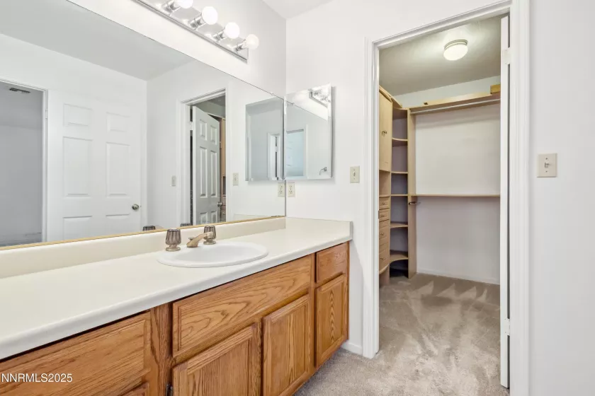 Primary Bathroom + Walk In Closet