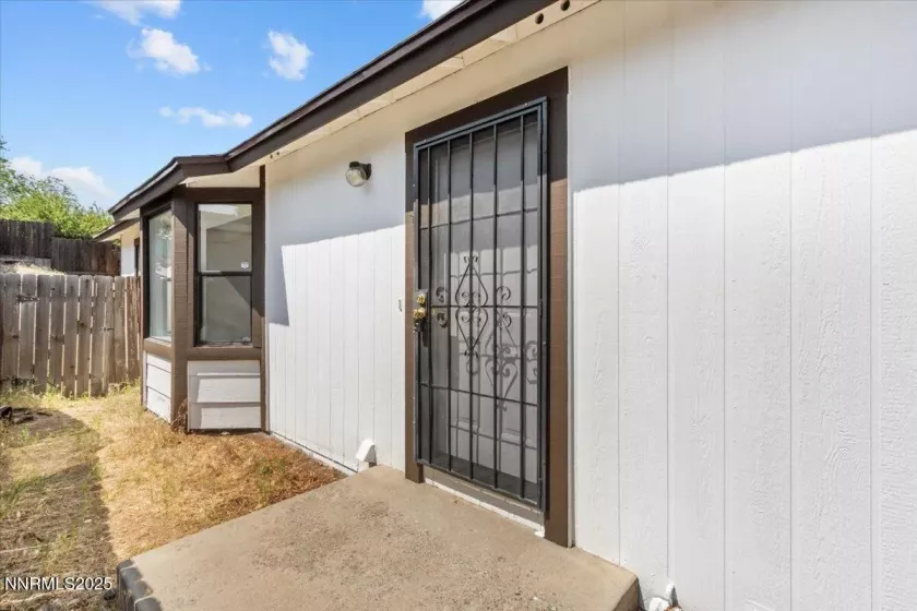 Updated exterior photo, yard work completed after professional photos