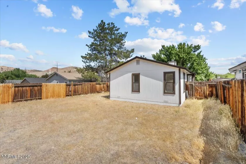 Updated exterior since yard work completed after professional photos