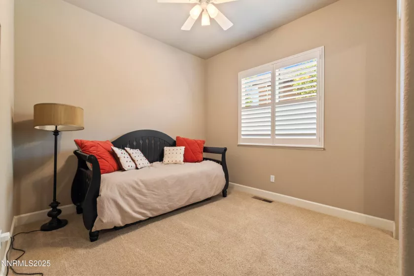 This room is being used as a media room, but can be the 4th bedroom