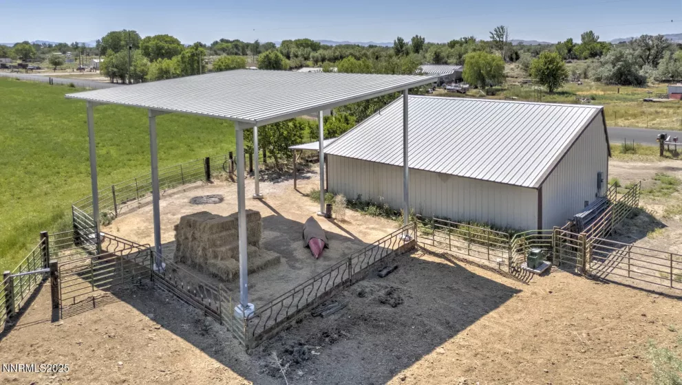 Southeast view of hay storage and shop