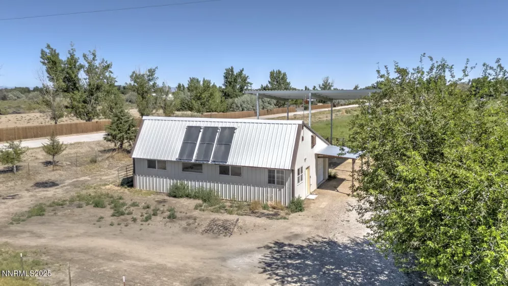 Northwest vew of shop and solar panels