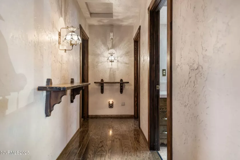 Hallway to guest bathroom and both bedrooms.