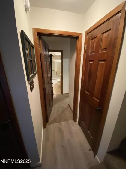 Entry level hall leading to Guest Bedroom, or Studio, Mother-In-Law suite with kitchenette.