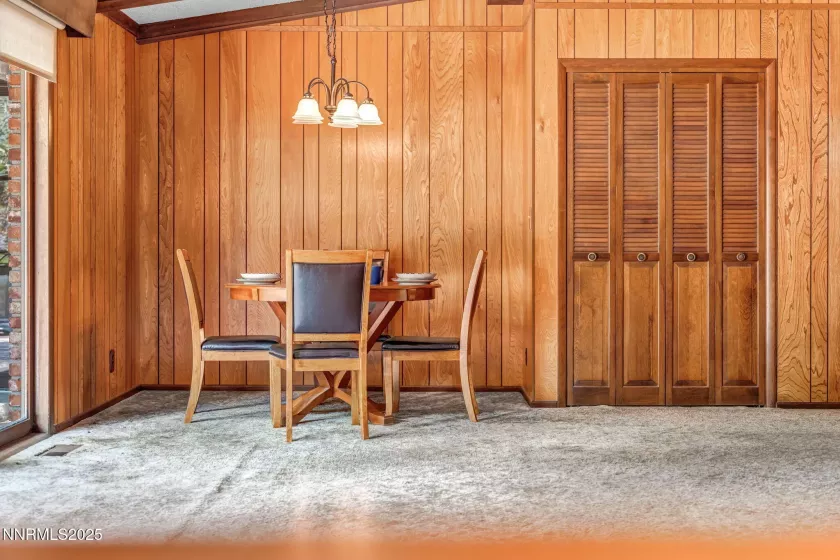 Cozy dining nook—ideal for intimate meals or the perfect poker night with friends.