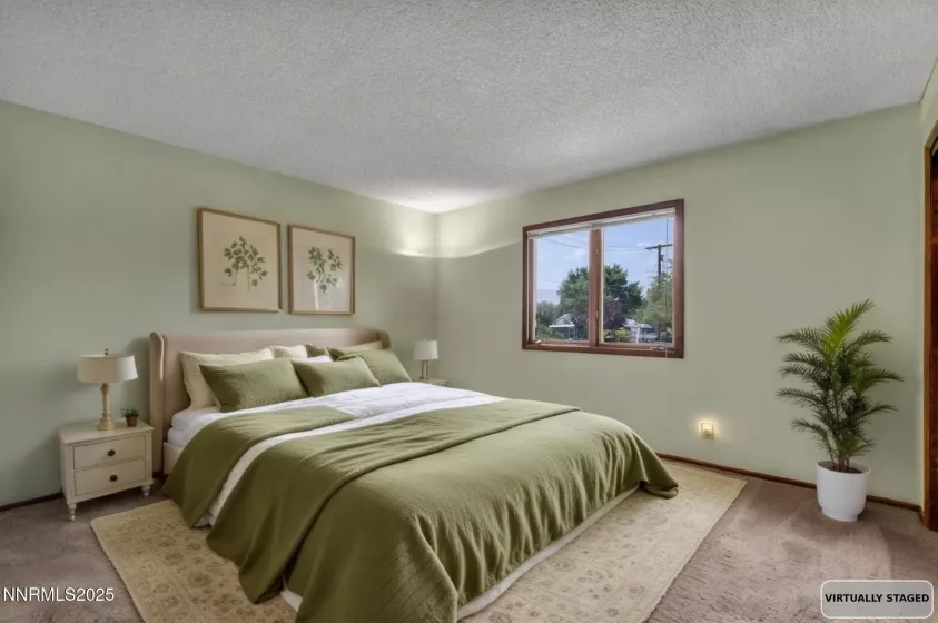 Guest bedroom 3 also features spacious layout, abundant natural light, and ample closet space.
