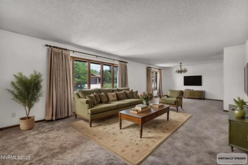 Expansive living room filled with natural light, perfect for gatherings and showcasing vintage elegance. Expansive living room filled with natural light, perfect for gatherings and showcasing vintage elegance. Ask ChatGPT