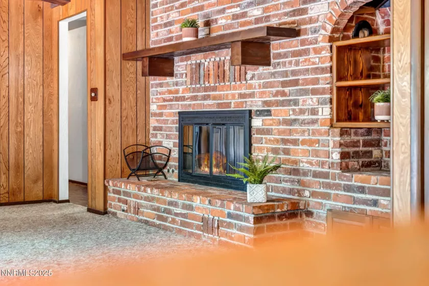 Authentic brick fireplace radiating vintage charm and inviting comfort.