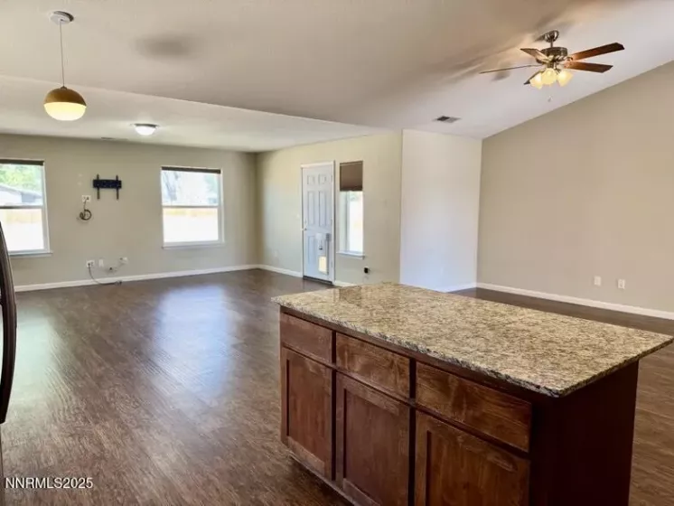 Kitchen looking into the living room and dining room.