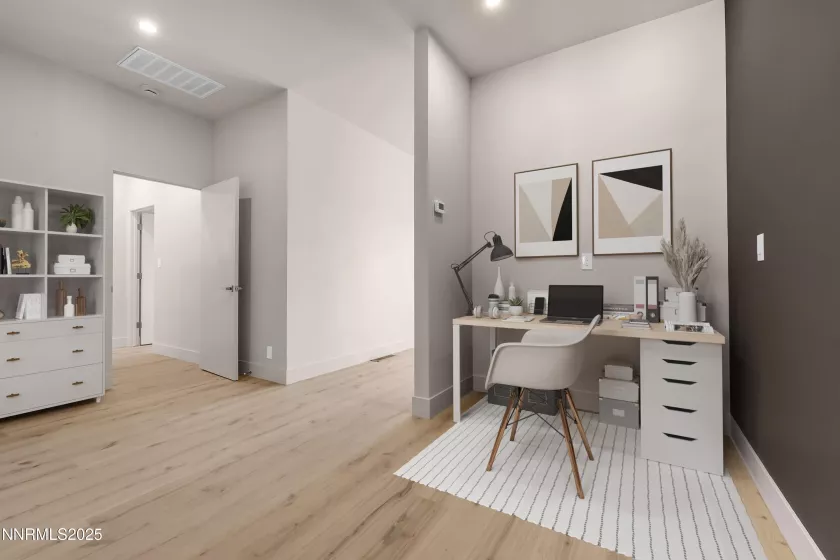 primary bedroom nook staged as office area