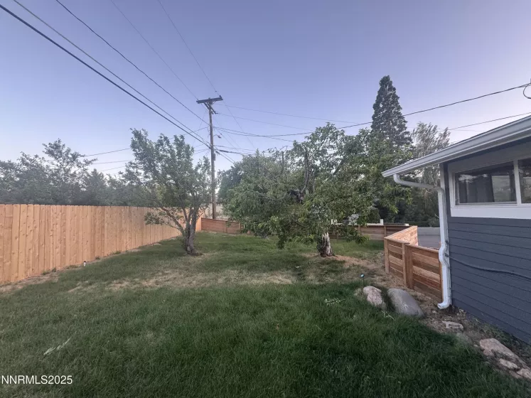 Bluegrass/Fescue/Derby Blend lawn in rear of home at orchard