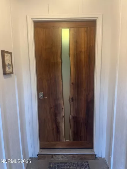 Artist crafted live-edge epoxy waterfall door