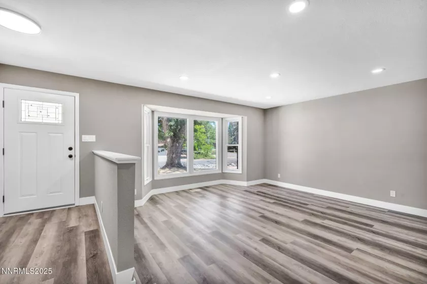 Entrance to home and living room