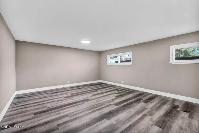 Walking in to the downstairs area bonus room or family room or rec room area