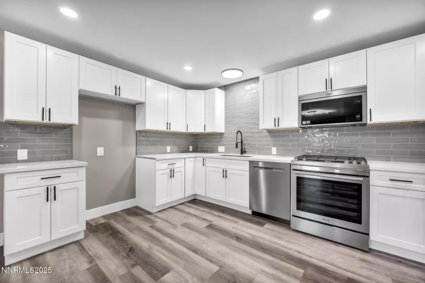 New kitchen showing new soft-close cabinets, new appliances