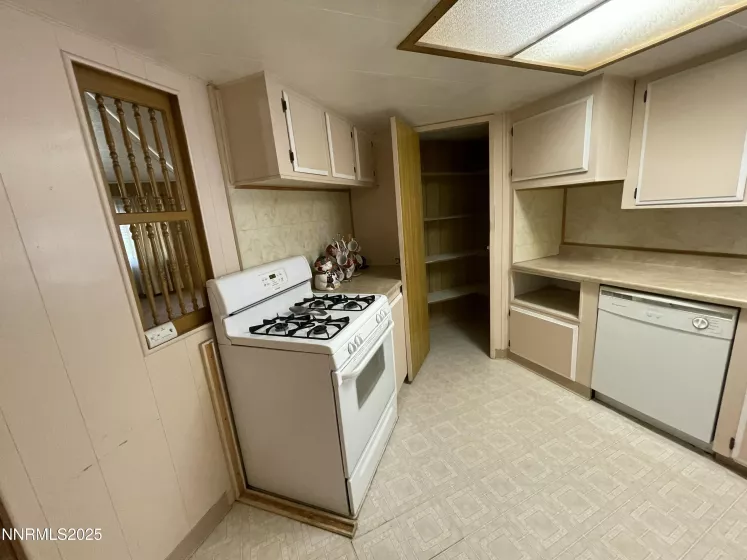 Kitchen with pantry.
