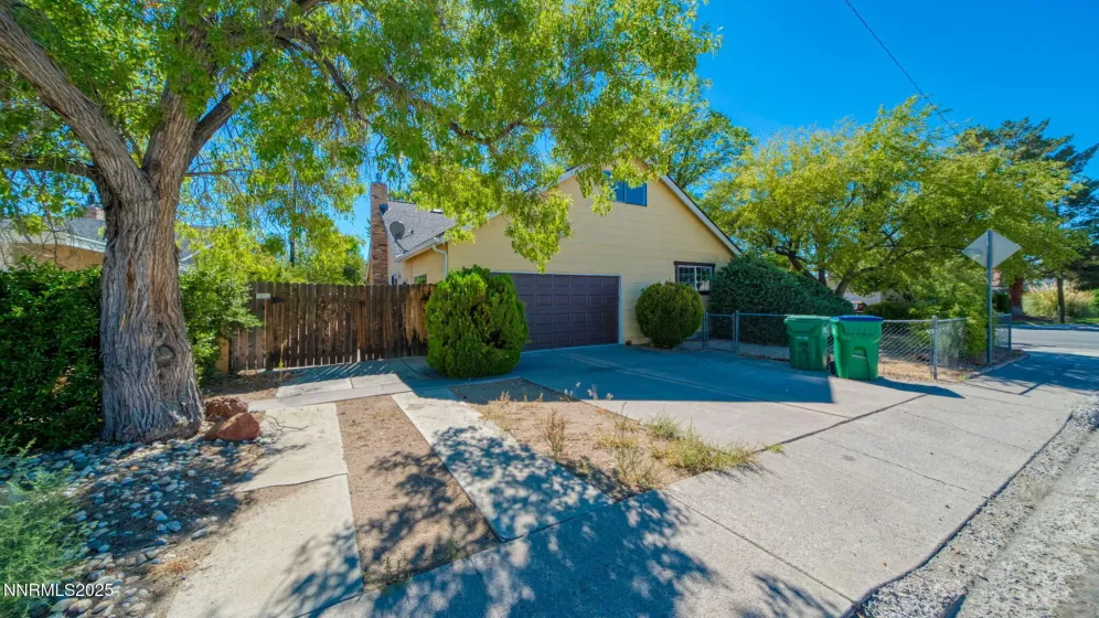 Garage entry and side yard