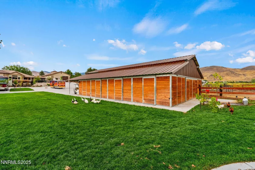 7 stall barn with water, and electricity, automatic waterers, tack room.
