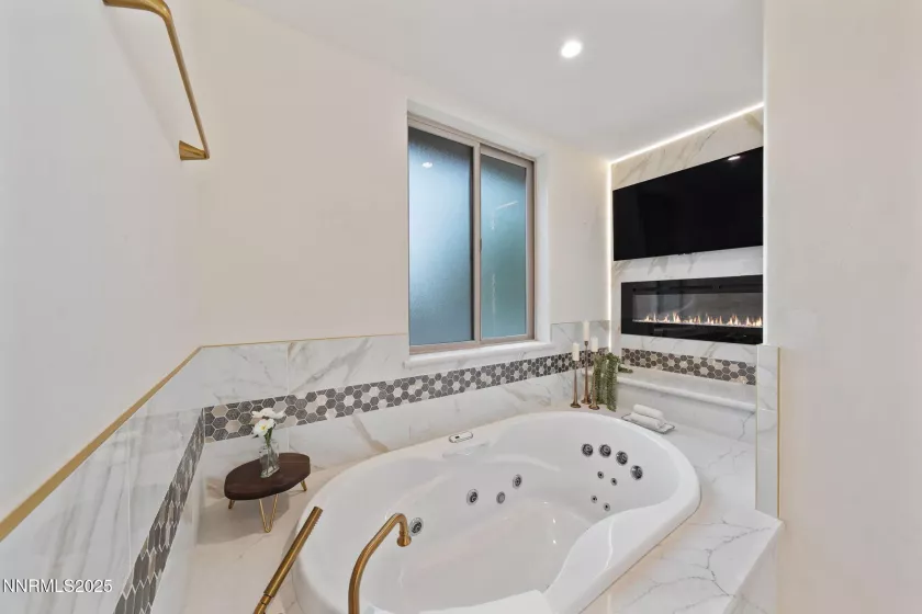 Primary Bathroom Jetted tub, fireplace