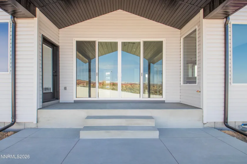 Previous build showing upgraded slider door and added primary bedroom patio door option.
