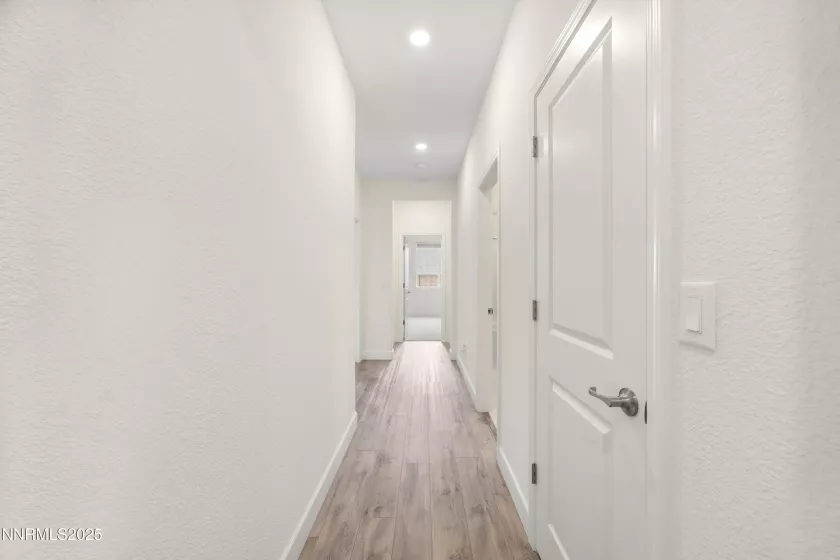 Entry hallway along the great room and kitchen