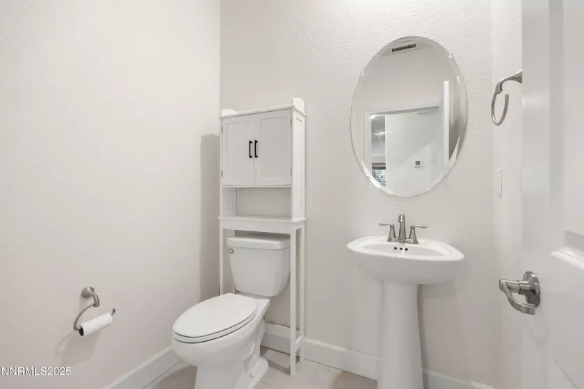 Powder room off the entry hallway