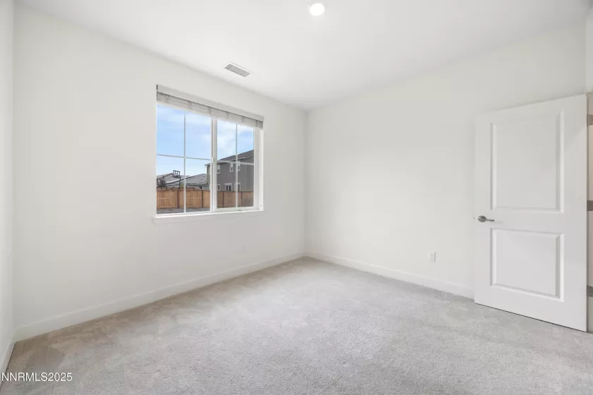 Spacious bedroom with natural light