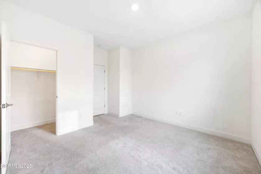 Well-sized bedroom ideal for kids, guests, or home office
