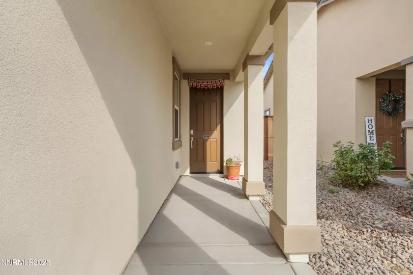 Front covered porch with entry door