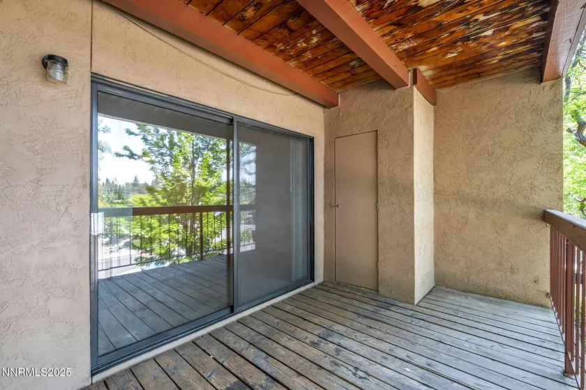Deck and Sliding glass doors. Storage closet.