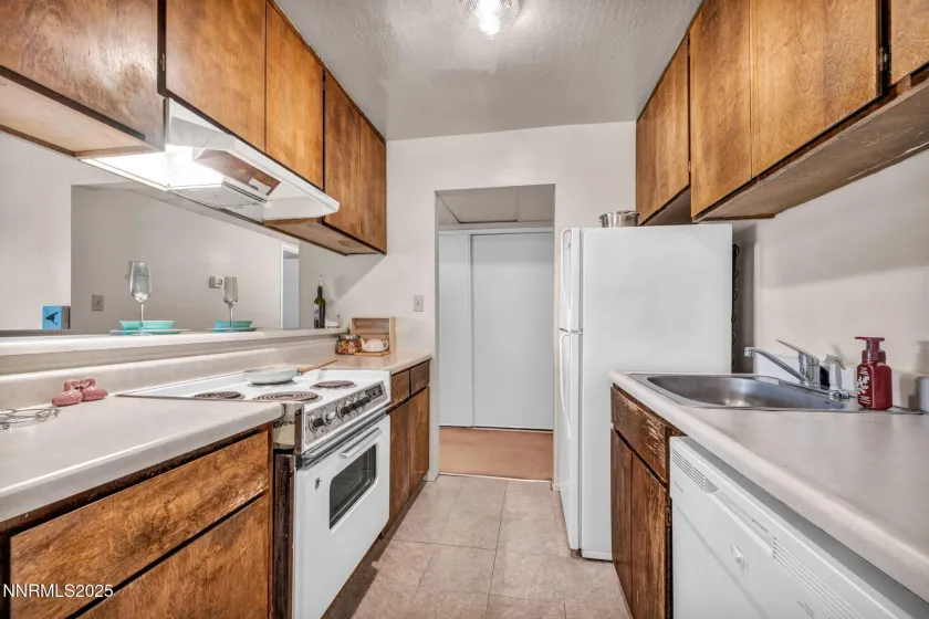 Easy access kitchen with breakfast bar.