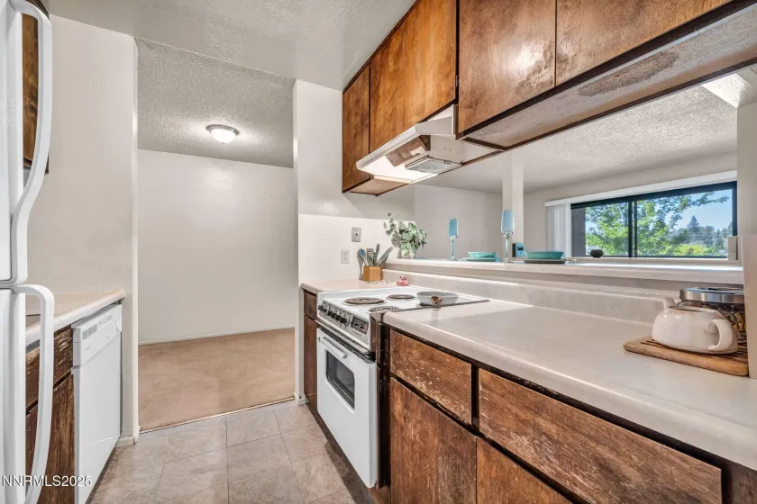 Easy access kitchen with breakfast bar.