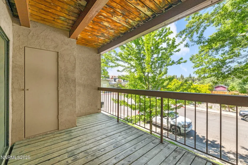 Deck with storage shed.