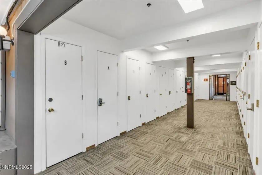 hallway as you enter with lockers for owners use