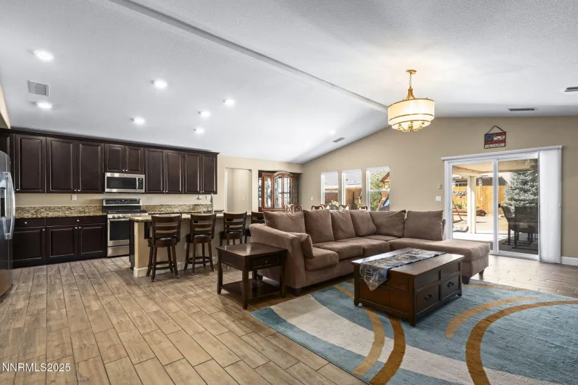 Kitchen, living room, dining room.