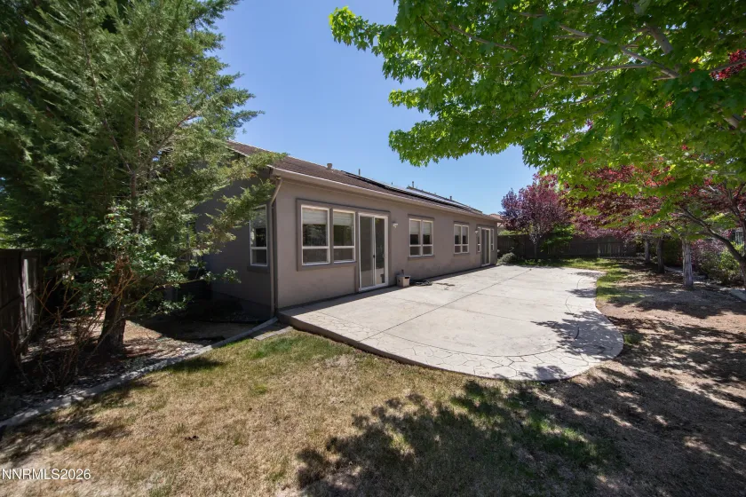 Private back patio has wide side yard with more trees! could be a perfect Dog Run