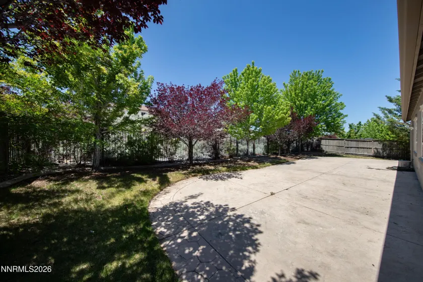 Perfect Shaded Backyard for Entertaining with another side yard.