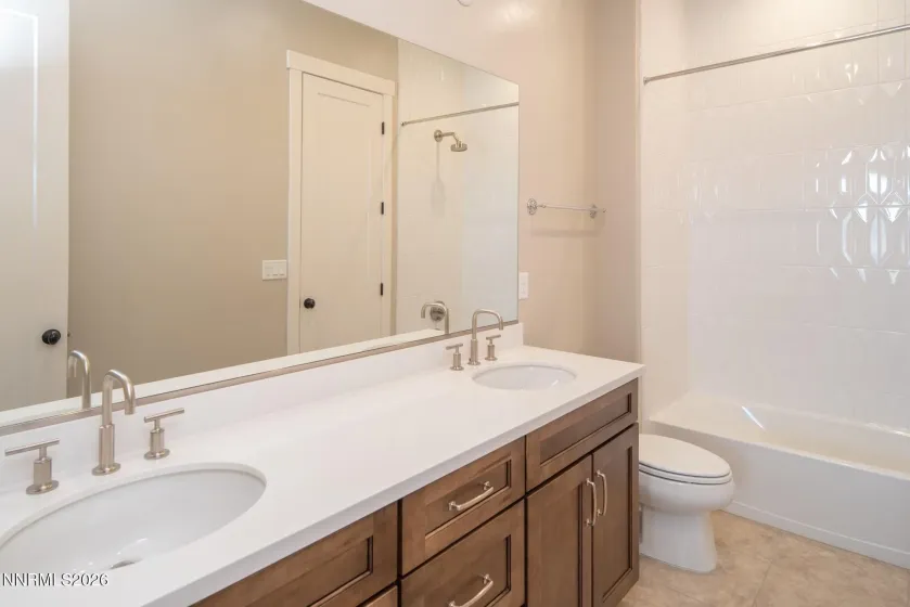 Fifth Bedroom Downstairs with Slider to Covered Patio