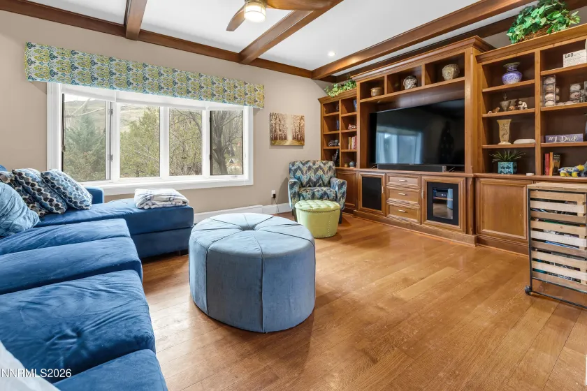 Formal family room with built-in entertainment center - bookcase
