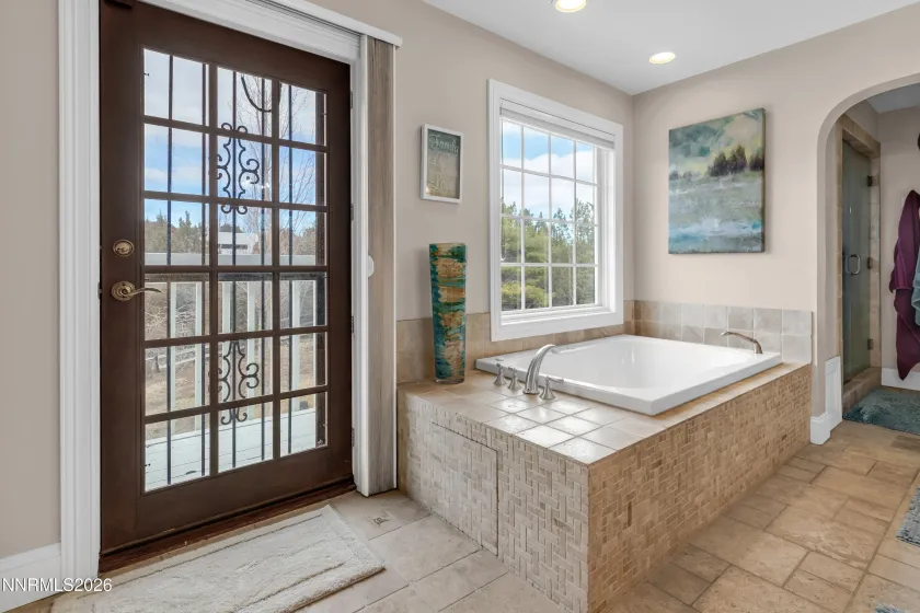 Master bathroom with jetted tub and deck
