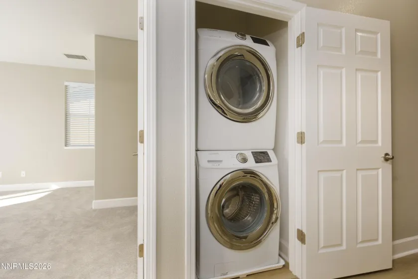 Stackable washer and dryer in upstairs hall