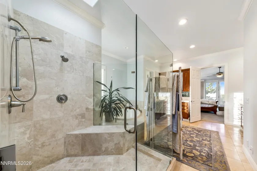 Primary suites walk in shower.