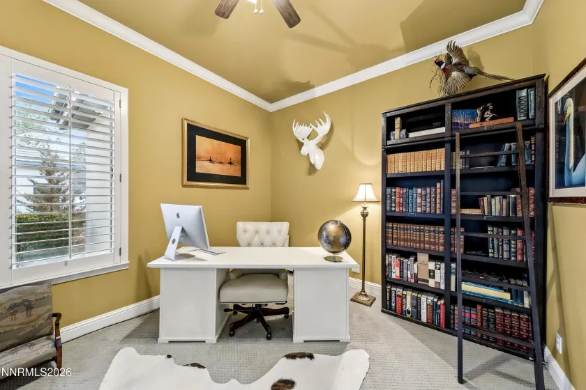 Designated office off of entrance with double doors.