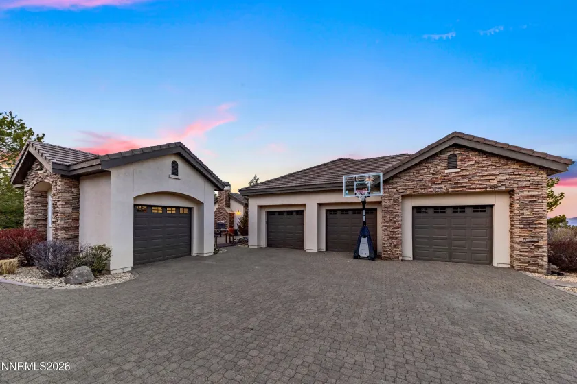 One unattached garage and three attached. South facing.