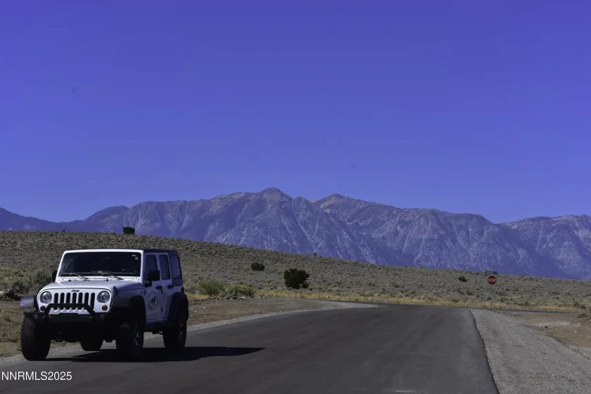 The Jeep is parked in front of the lot.