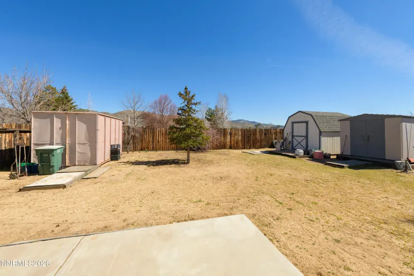 Backyard is fenced and sprinkereld and rest of lot is cross fenced in the rear