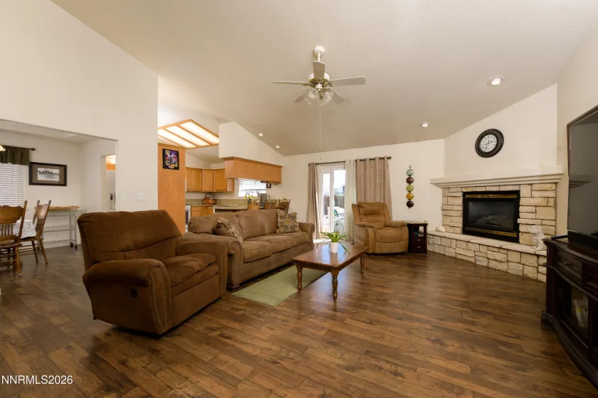Open great room with beautiful distressed hardwood flooring